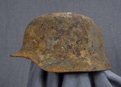 WWII German M40 Battle Damaged KIA Helmet